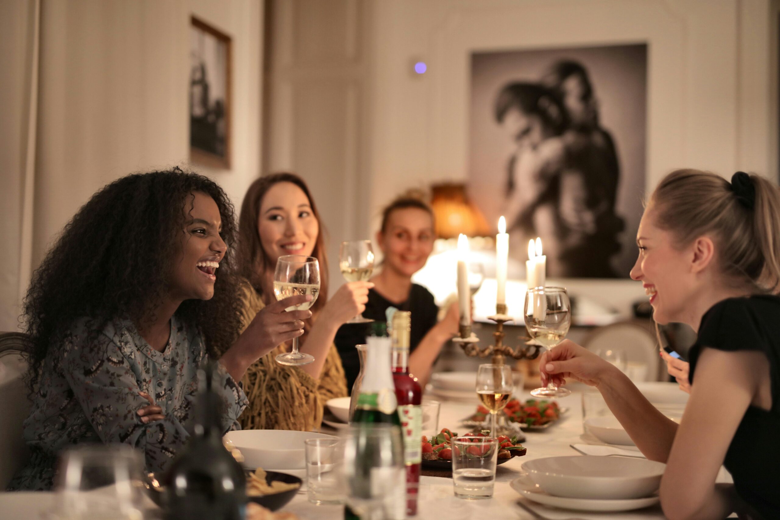 Wine glasses and bottles on a casual dining table